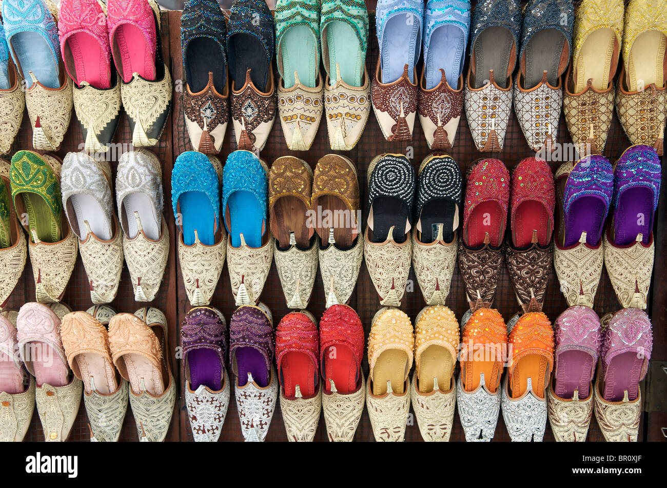 Traditional shoes for sale in Bur Dubai Souk Old Dubai UAE Stock Photo