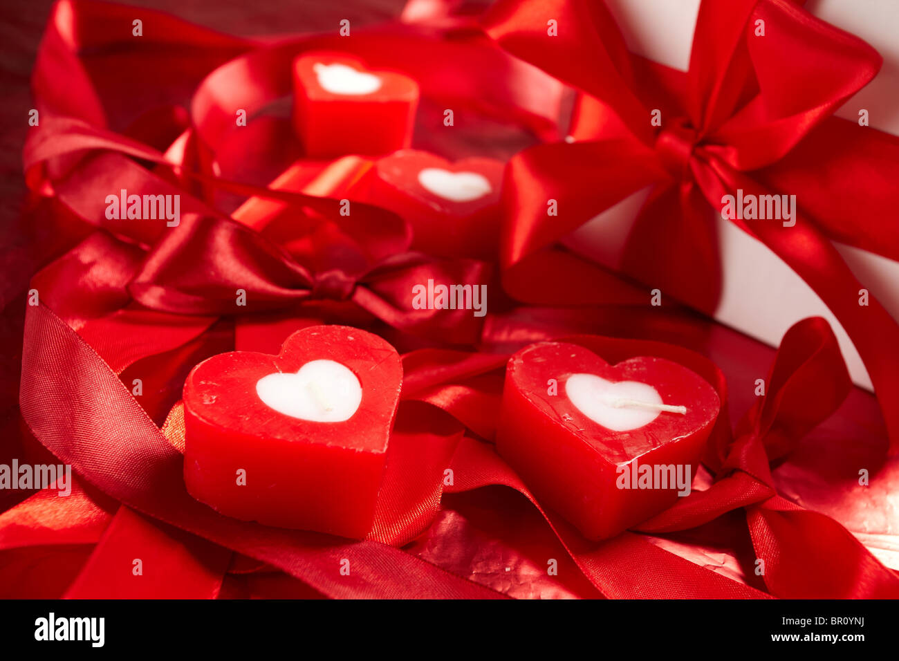 Romantic candles with gift Stock Photo Alamy