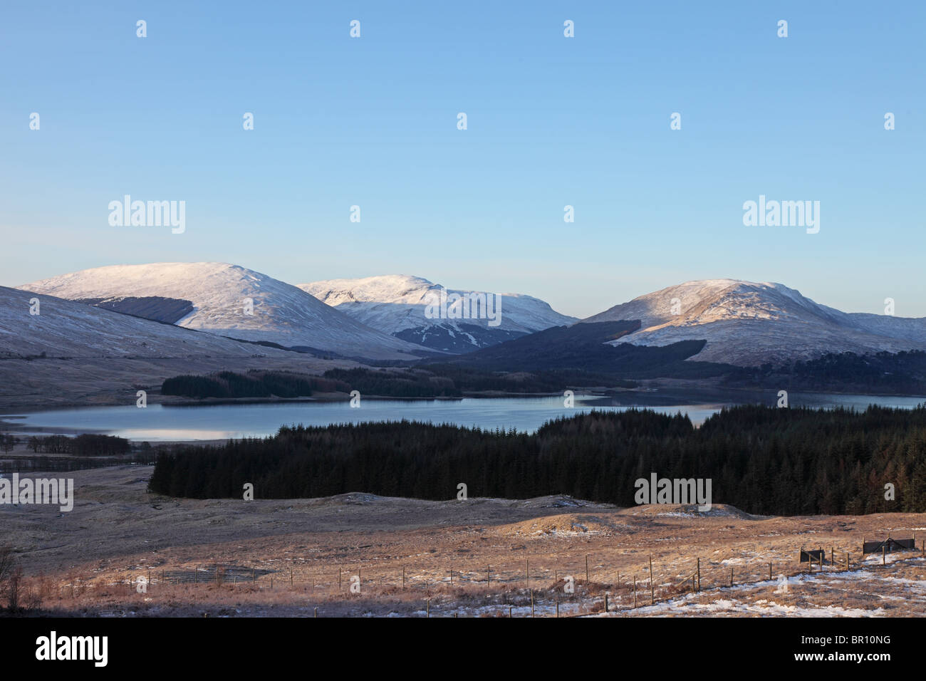 Snow on the Mountains Across Loch Tulla From the A82 Road Scotland UK Stock Photo