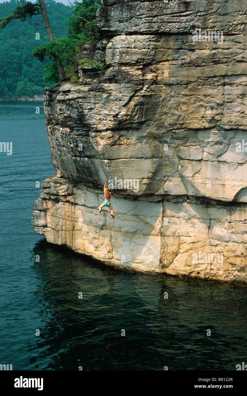 Female deep water soloing at Summersville Lake, West Virginia. Stock Photo
