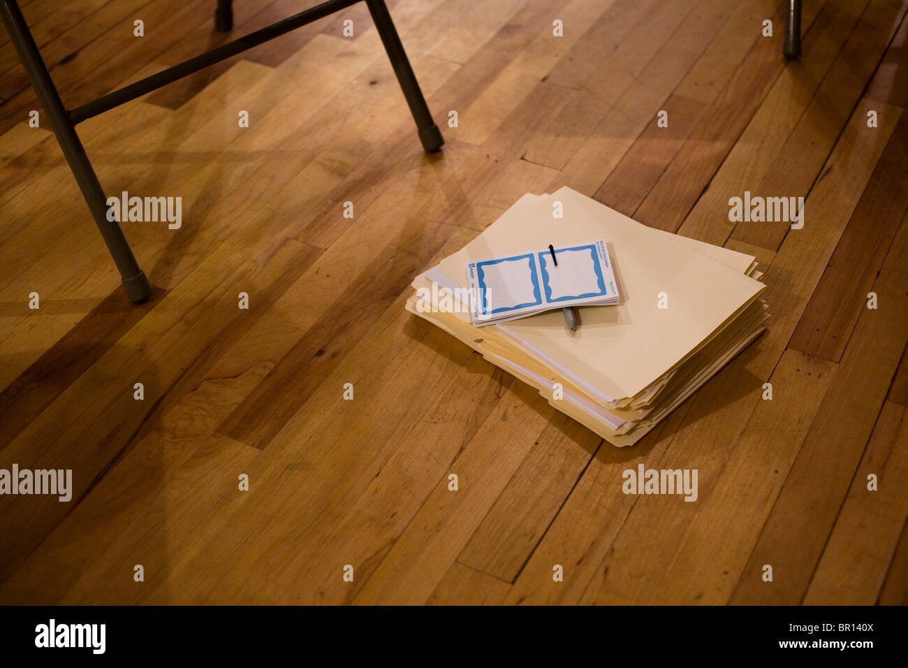 Name tags, folders, and folding chairs at the Vermont Democratic Party