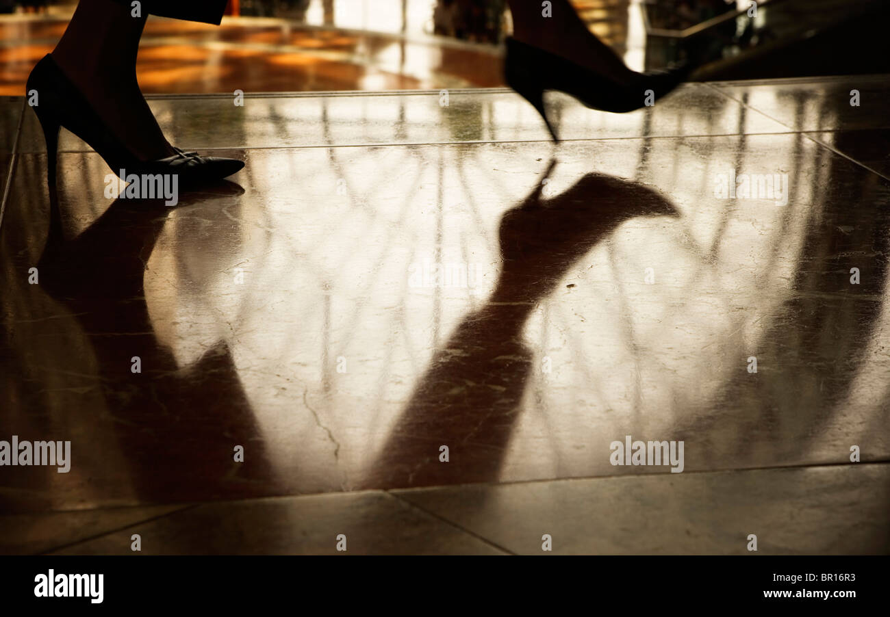 A woman's feet in high heel shoes walking Stock Photo Alamy