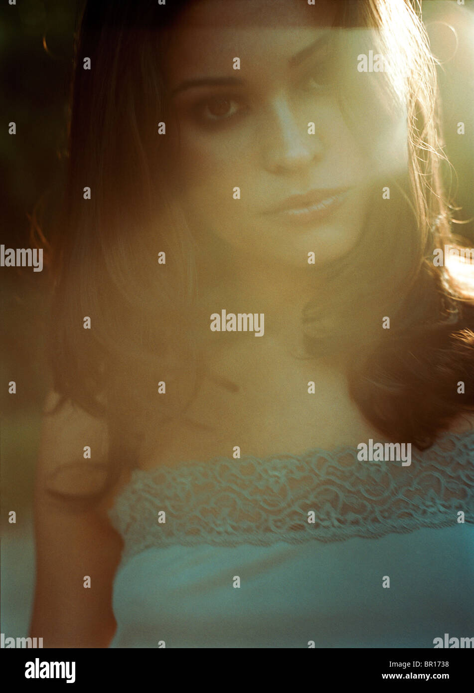 Woman in sunlight Stock Photo