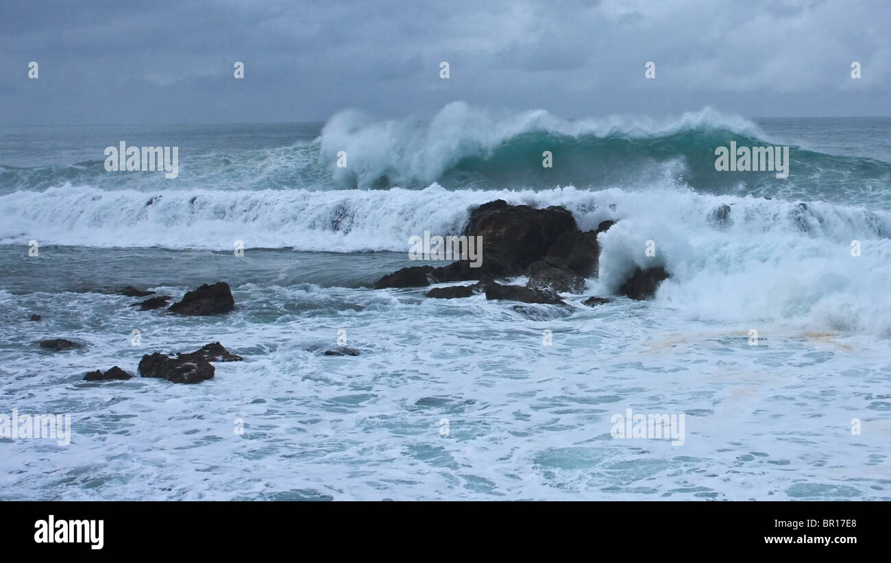 Waves Crash over Shark's Cove Stock Photo