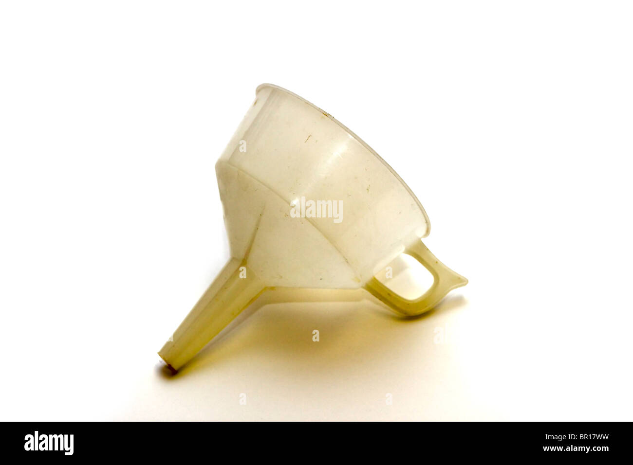 Dirty white plastic funnel Stock Photo