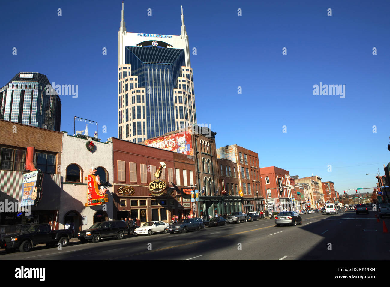 Lower Broadway in Nashville, TN with its mix of touristy country music related attractions juxtaposed with a booming commercial Stock Photo