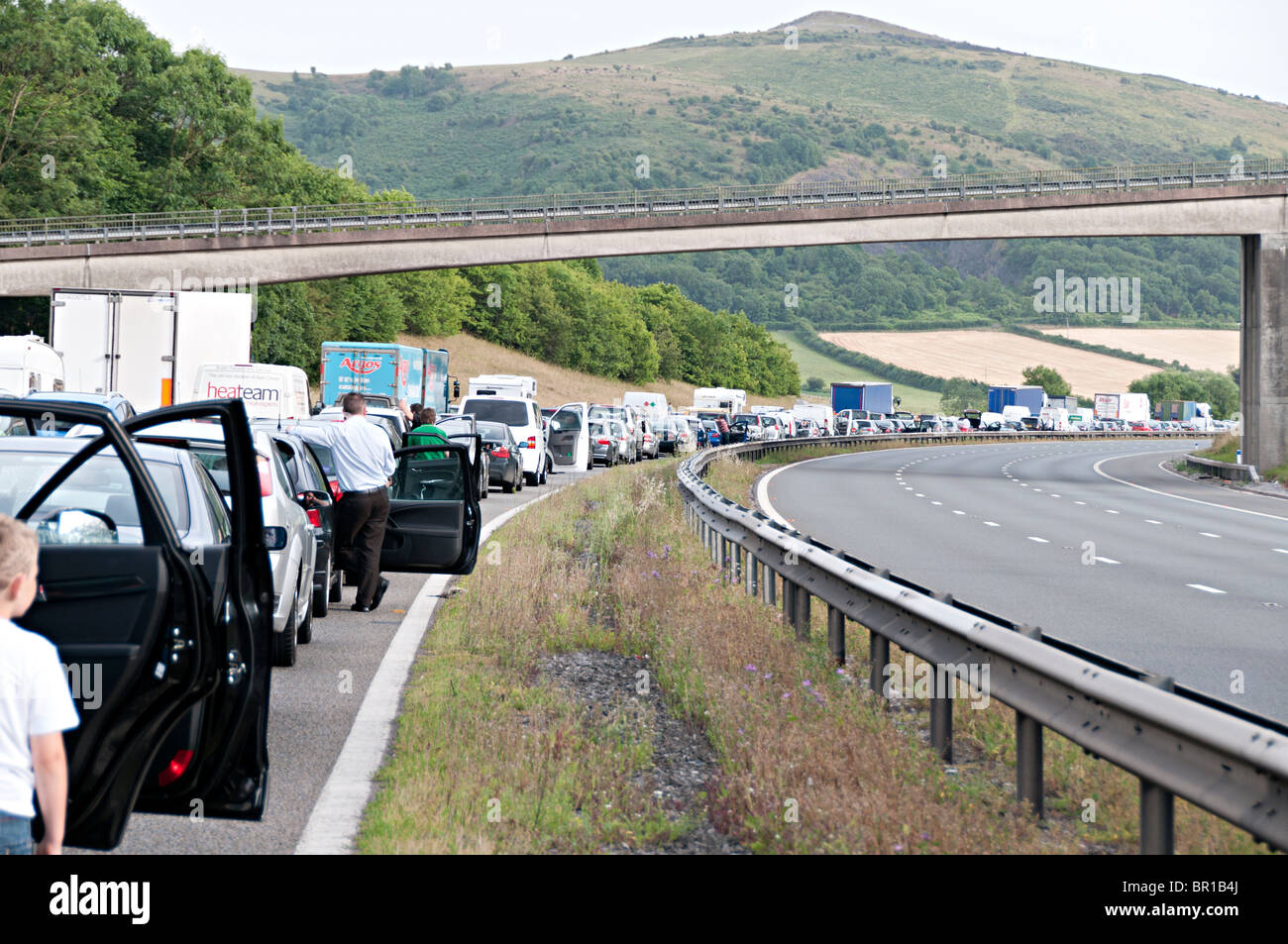 a closed m5 motorway with one carriageway closed to traffic following