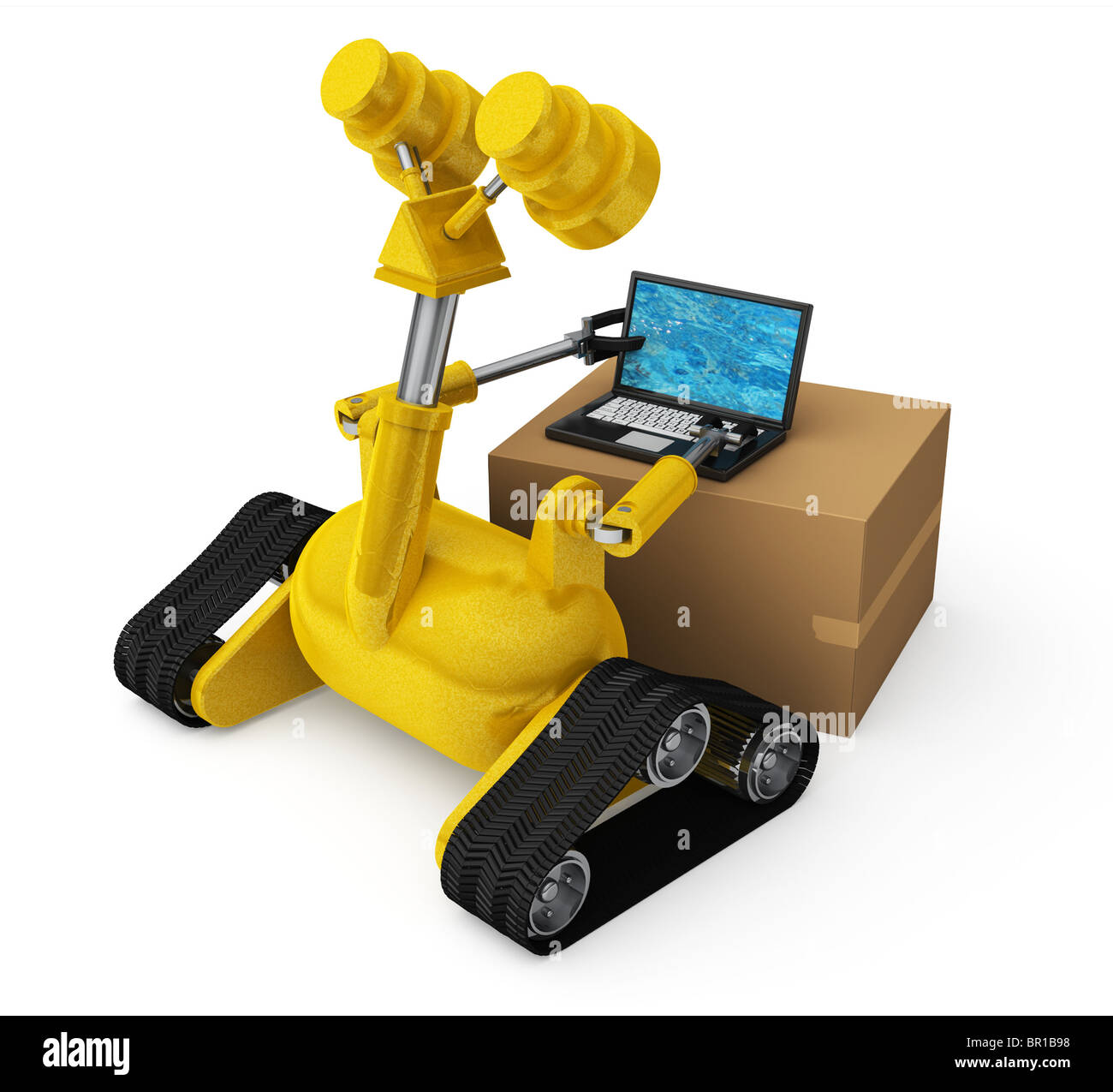 A yellow robot trying to use a laptop computer on top of a cardboard box Stock Photo