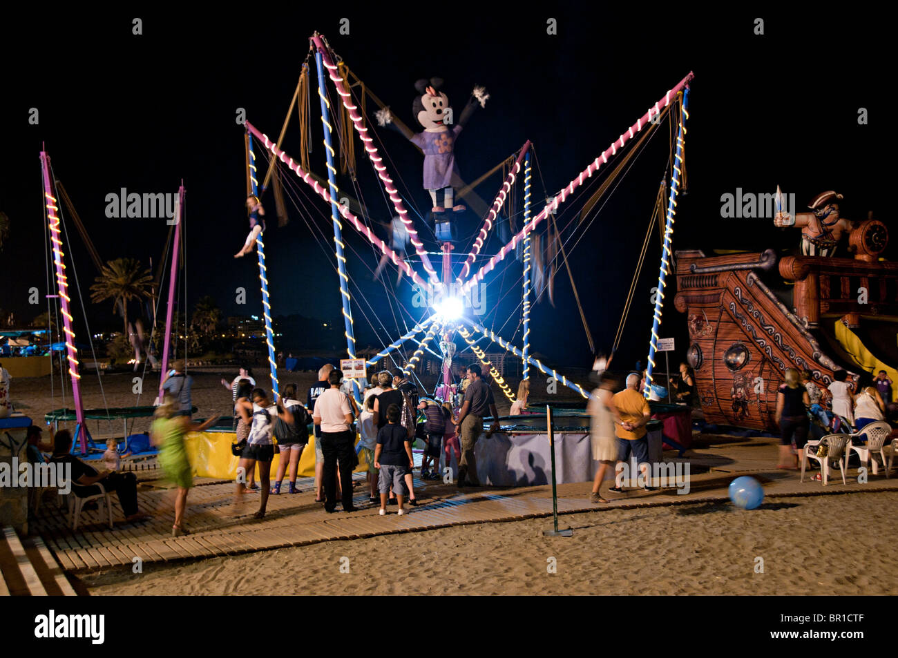 Estepona Spain In The Evening With Beach Child Trampoline