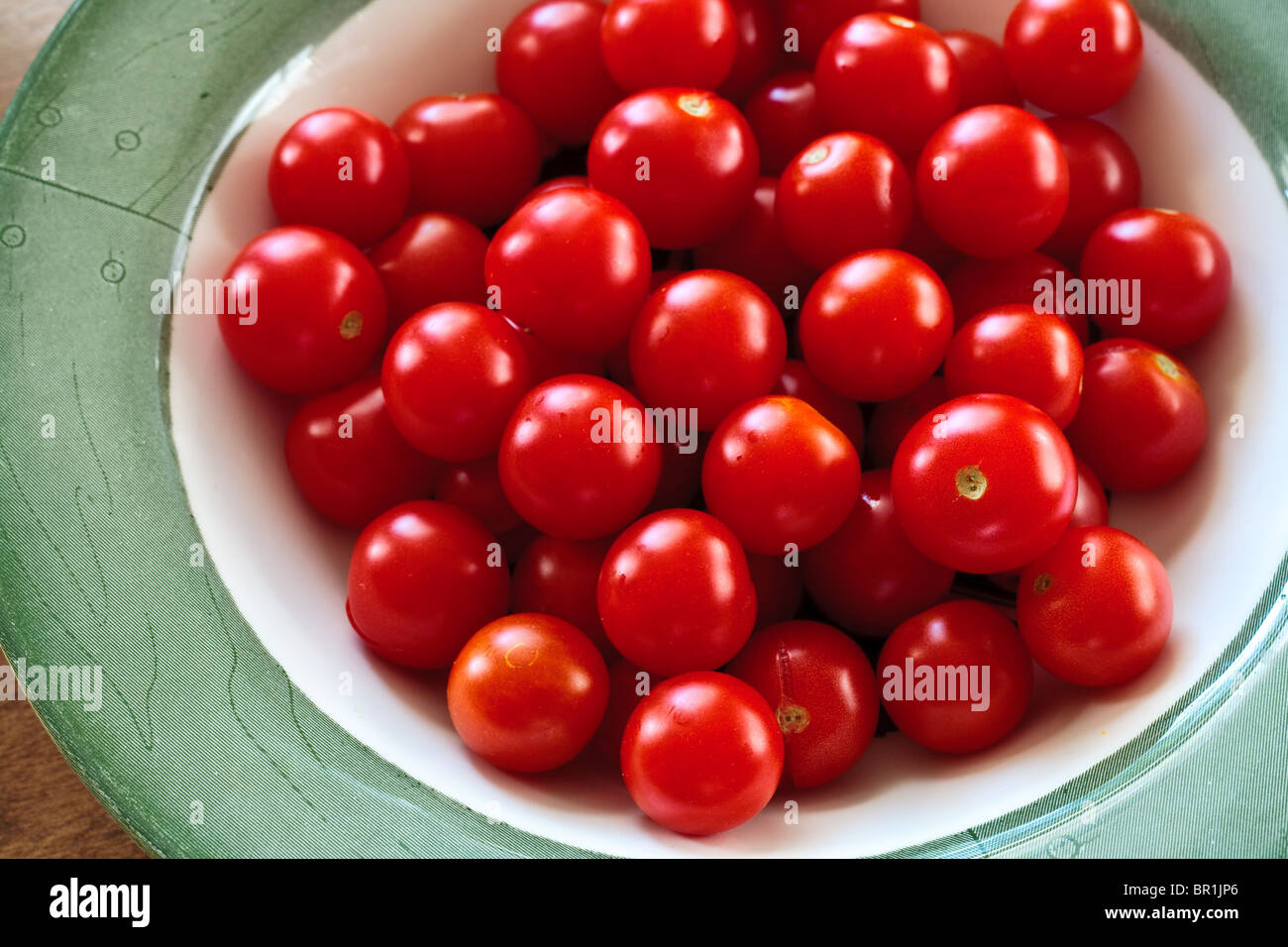 Cherry tomatoes in a bowl Stock Photo - Alamy