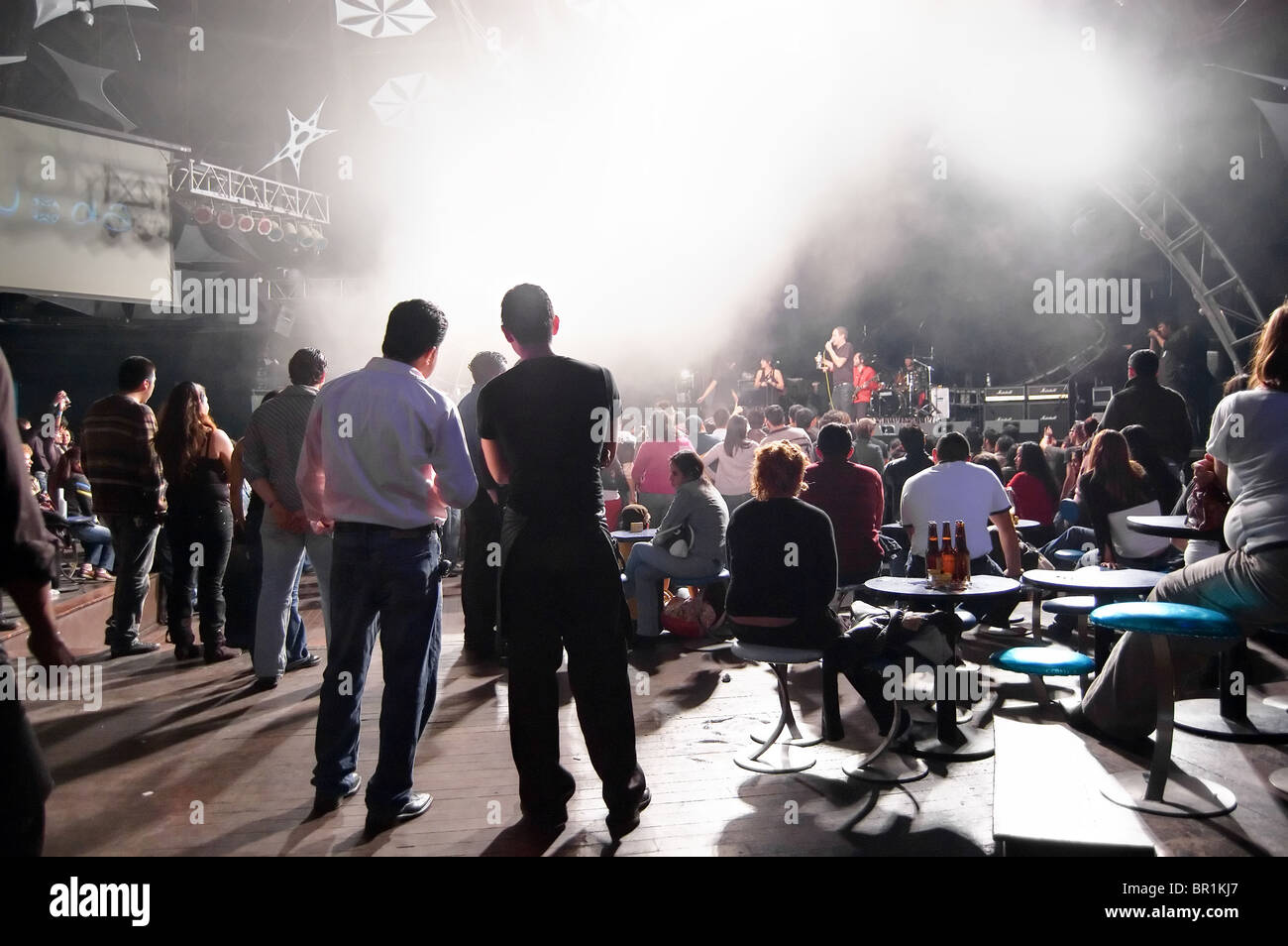 People watching a rock concert in a bar Stock Photo Alamy