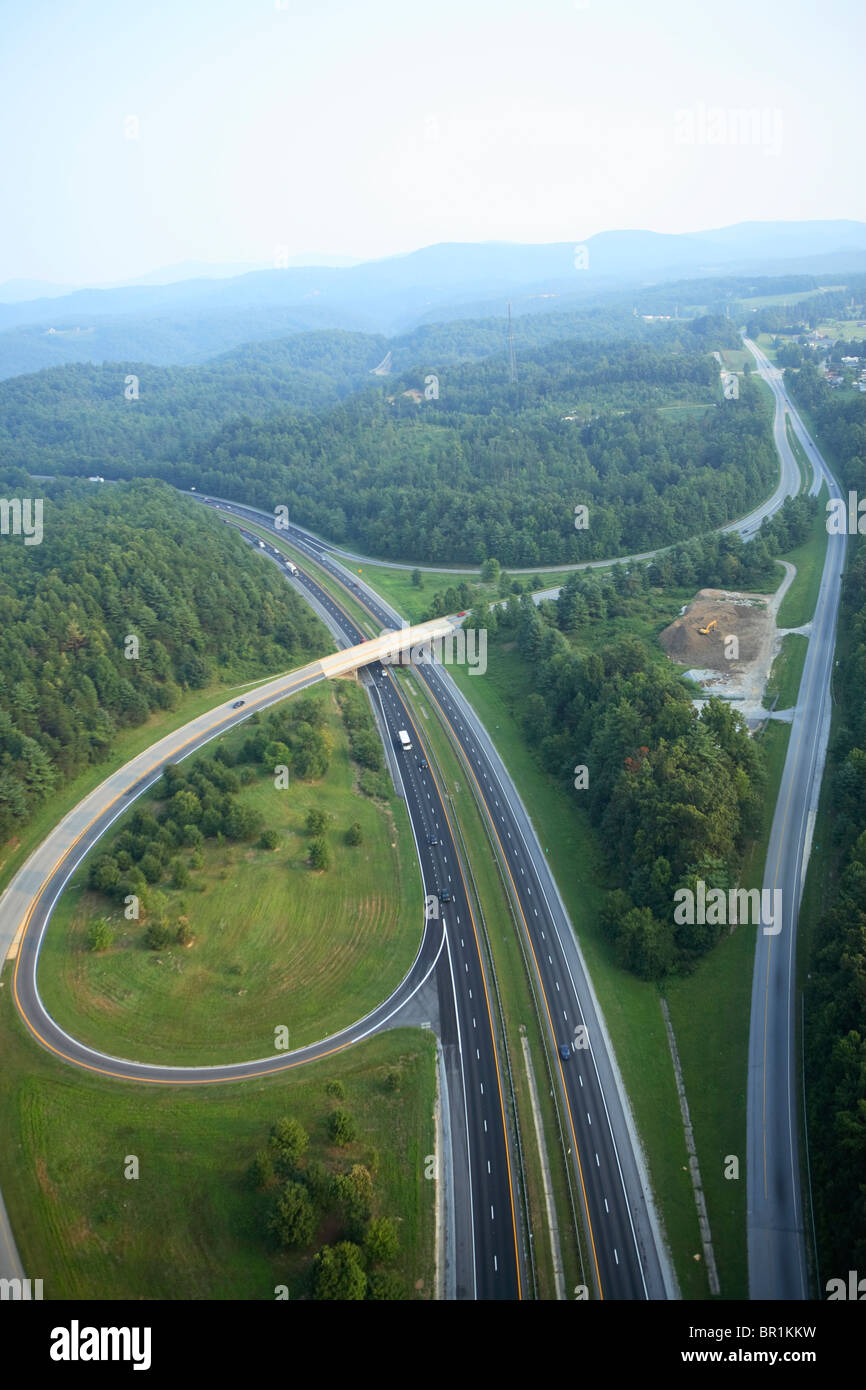 Aerial view of a highway interchange with a partial cloverleaf pattern near Hendersonville, NC Stock Photo