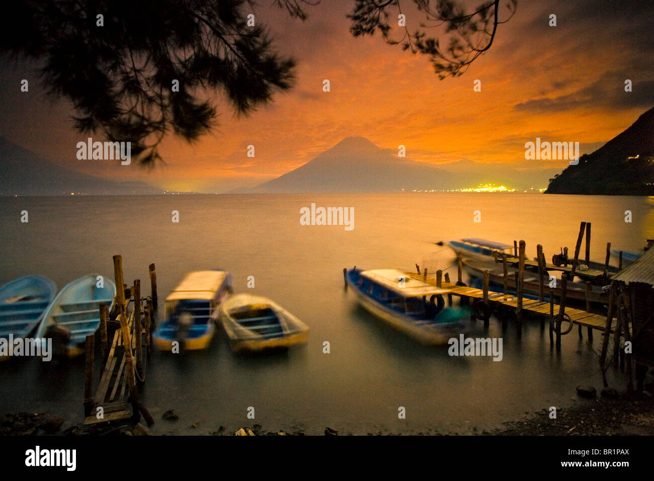 Boats moored for the night Lake Atitlan, Santa Cruz, Guatemala Stock Photo