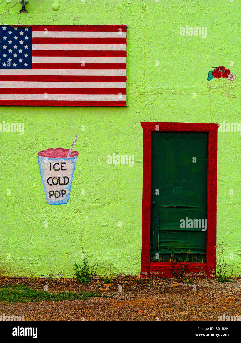 Green Wall & American Flag Stock Photo