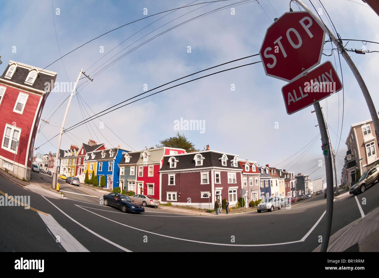 Fish-eye image of colorful jelly bean row houses, junction of Cochrane and Gower Streets, St. John's, Newfoundland, Canada Stock Photo