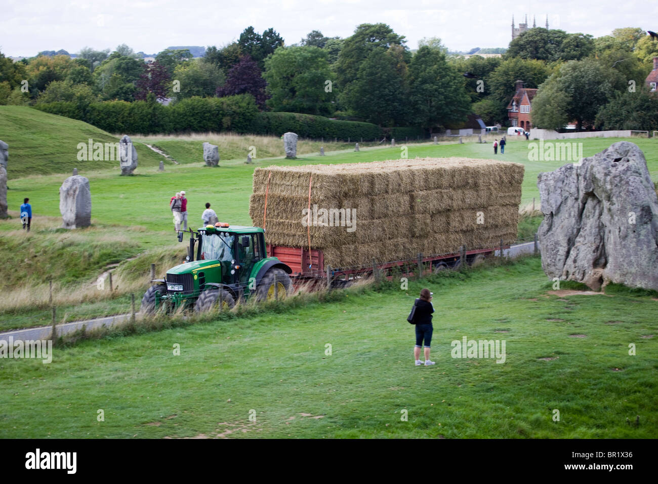 Straw Laden Lorry passing through village of Avebury Wiltshire UK Stock Photo