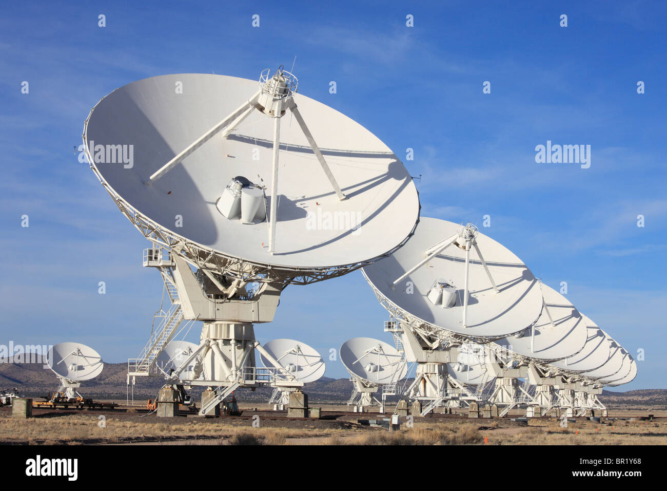 Radio telescope dishes in the Very Large Array, New Mexico, are arranged in the 'D' configuration. Stock Photo