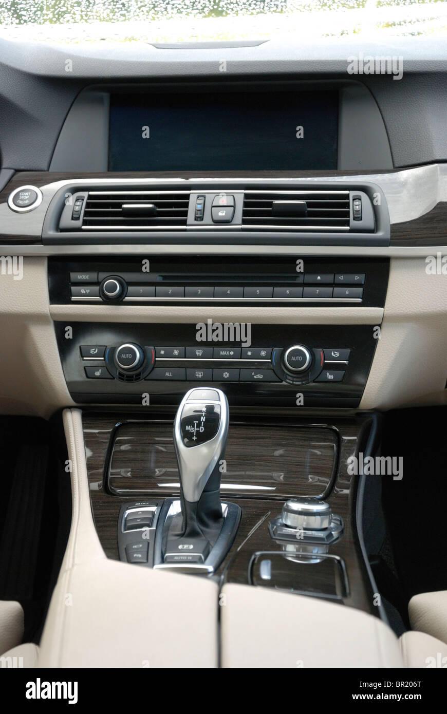 BMW 535i - MY 2010 -  Premium German higher class sedan, segment E (executive) - details: central console, dashboard, iDrive Stock Photo