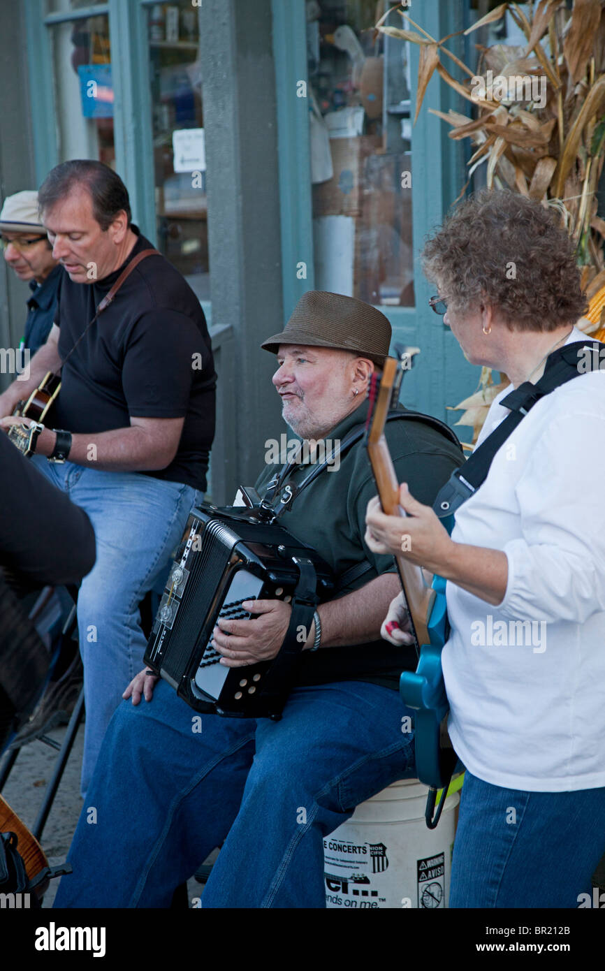 Metamora, Indiana - A bluegrass band plays on the street during the Old Time Music Festival in Metamora, Indiana. Stock Photo