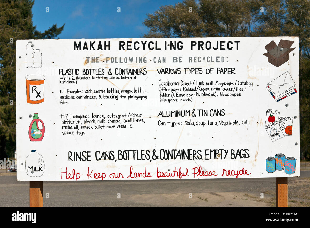 hand lettered painted recycling sign with simple whimsical illustrations on Makah Indian lands at Neah Bay Olympic Peninsula WA Stock Photo
