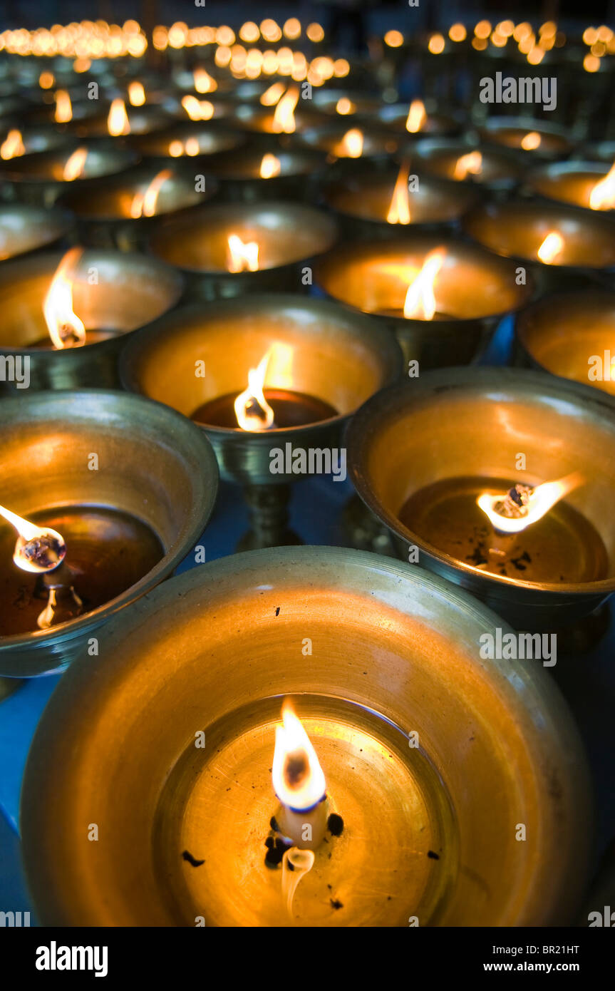 Votive candles glow in brass holders at Baoguo Si Temple, Emei Mountain,  Chengdu, Sichuan Province, China Stock Photo - Alamy