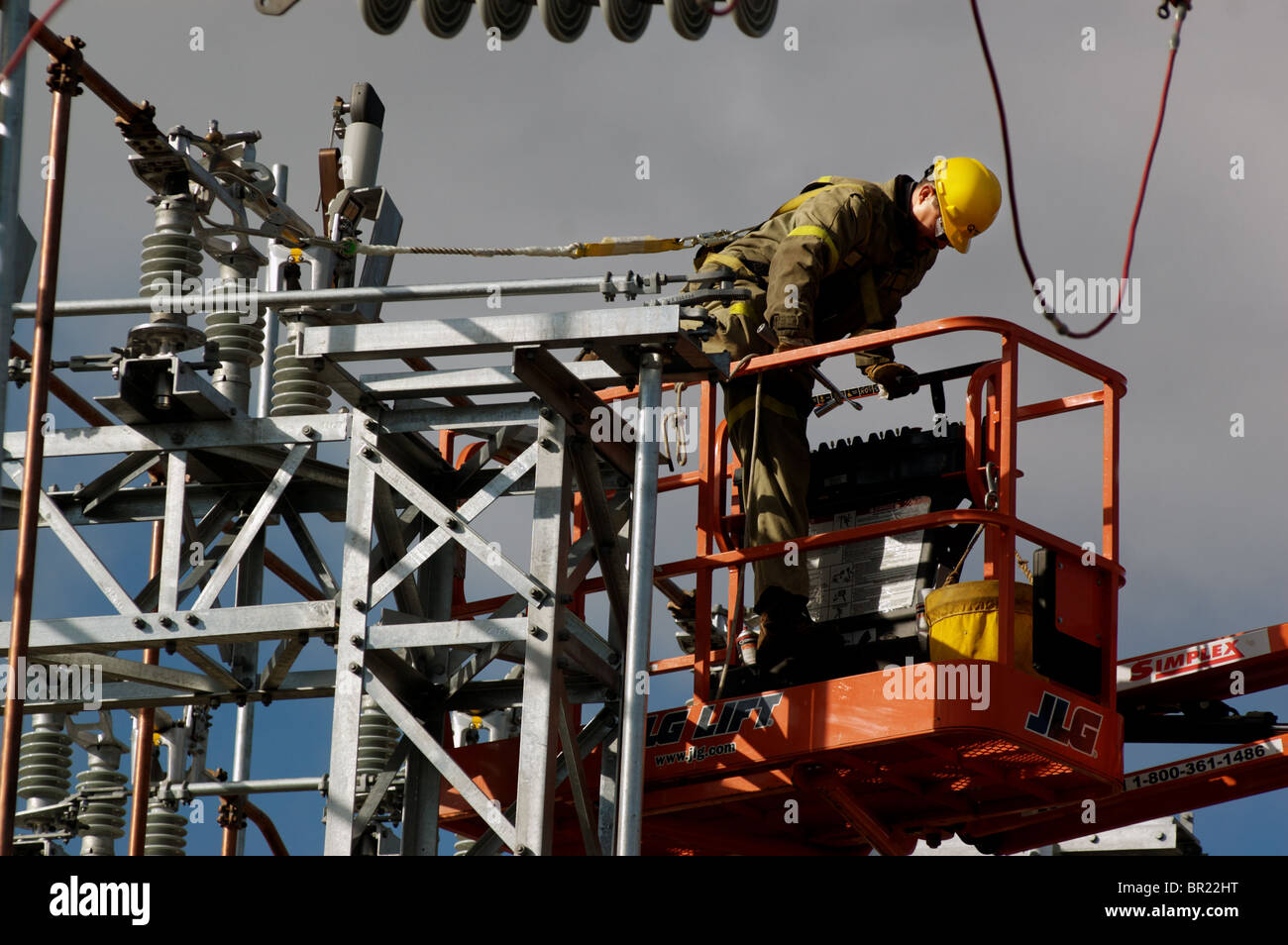 Man working on an electrical installation Stock Photo