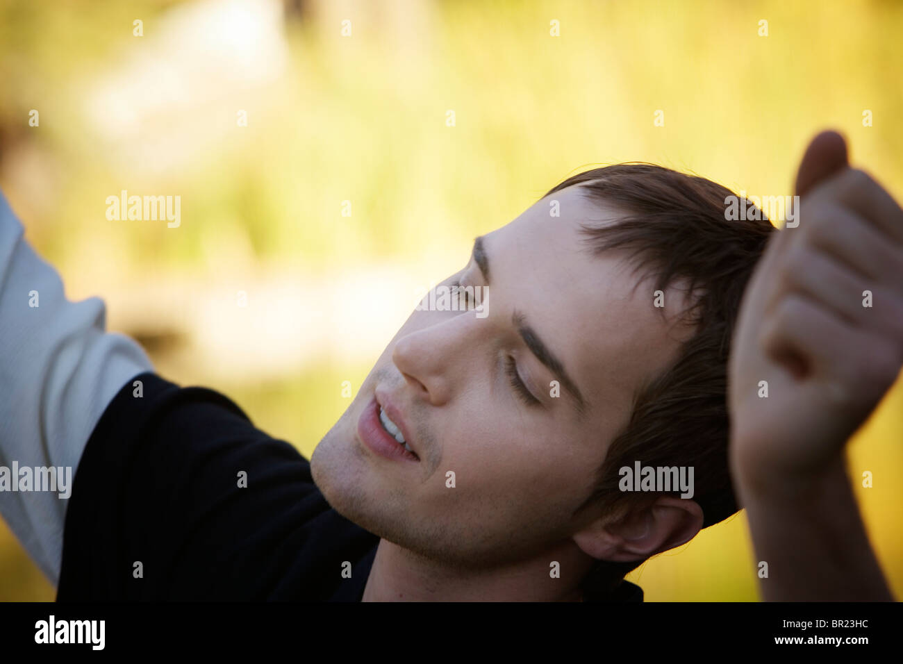 Portrait of a happy young man Stock Photo - Alamy