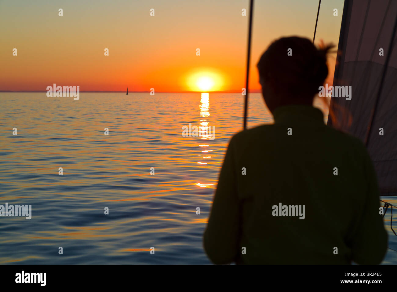 Sunset on a glassy sea Stock Photo