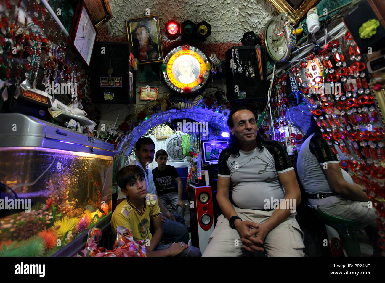 A man in his shop in Qaysari bazaar in the city of Erbil also spelled Arbil or Irbil the capital city of Kurdistan Region in northern Iraq. Stock Photo