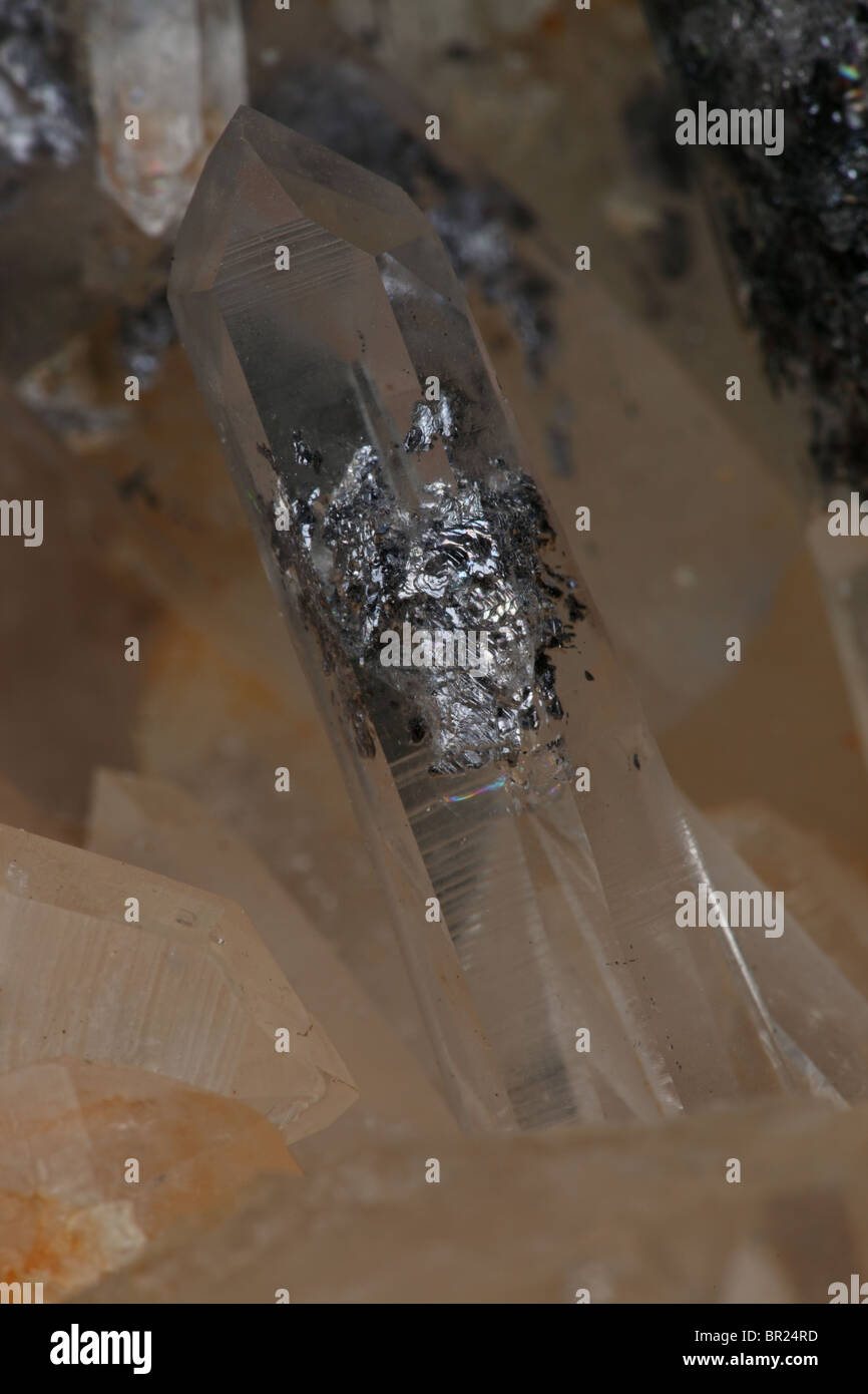 Quartz (SiO2 - silicon dioxide) with rare galena inclusions Stock Photo ...