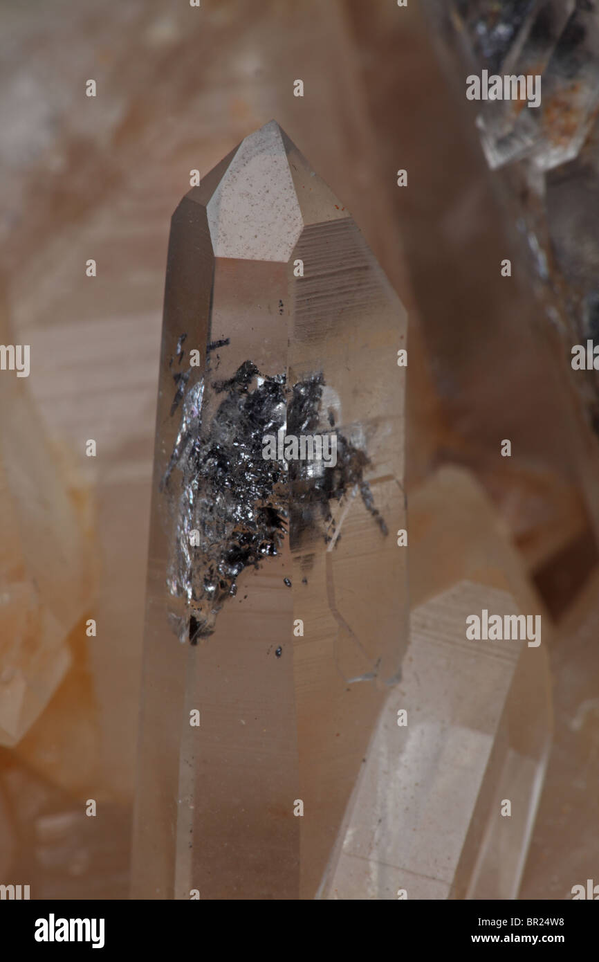 Quartz (SiO2 - silicon dioxide) with rare galena inclusions Stock Photo ...