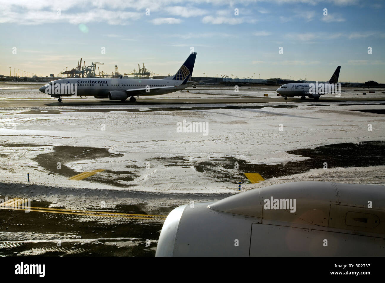 Air planes are waiting for take-off on a runway Stock Photo