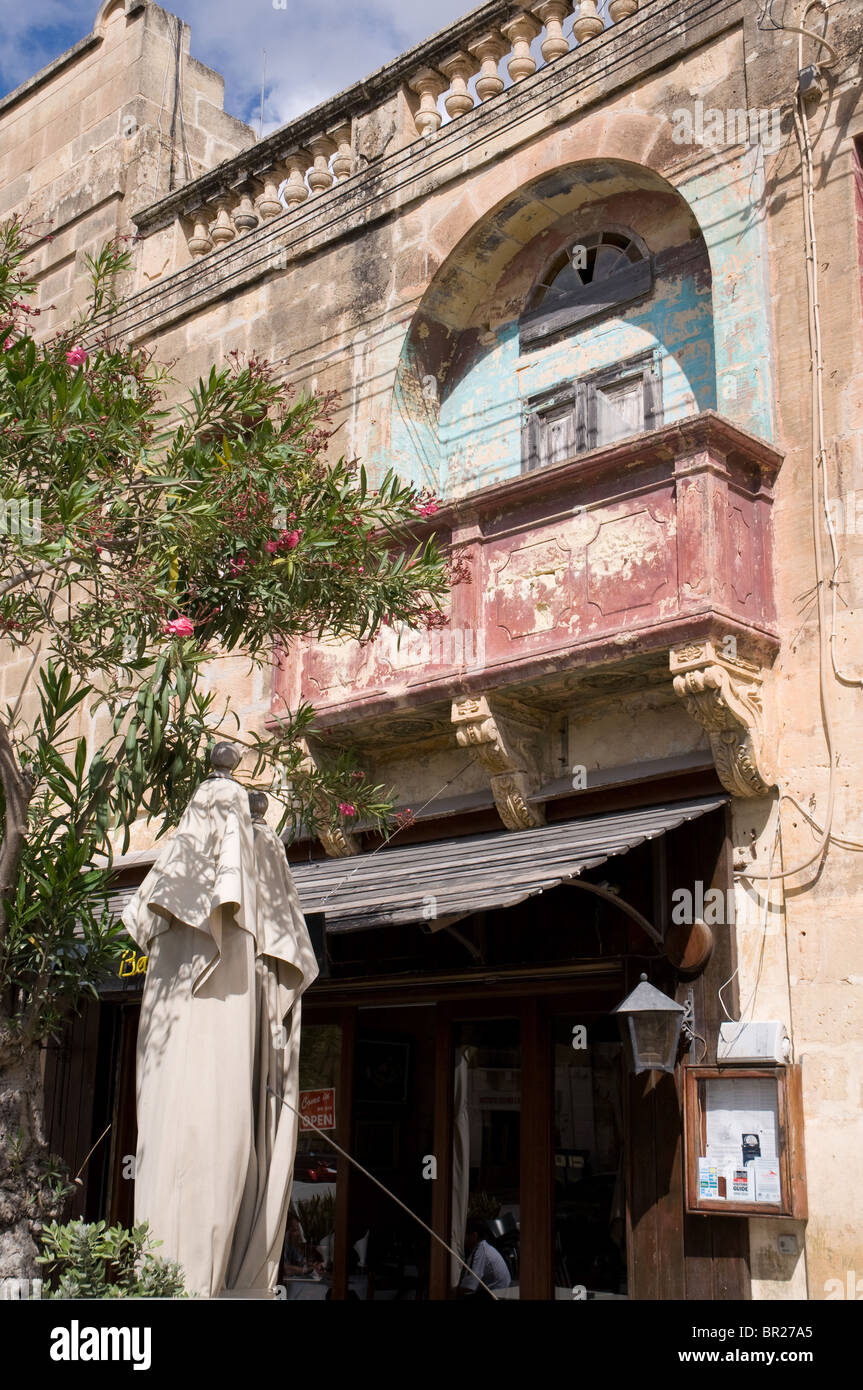 Cafe in Xaghra Gozo village old building traditional balcony Stock Photo