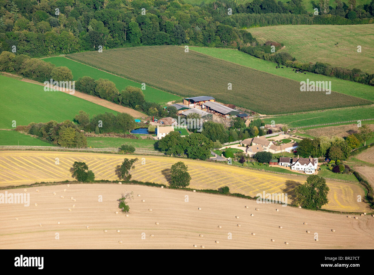 An aerial view of Newmeadow Farm 1ml S of the Cotswold village of Winchcombe, Gloucestershire from the north west. Stock Photo