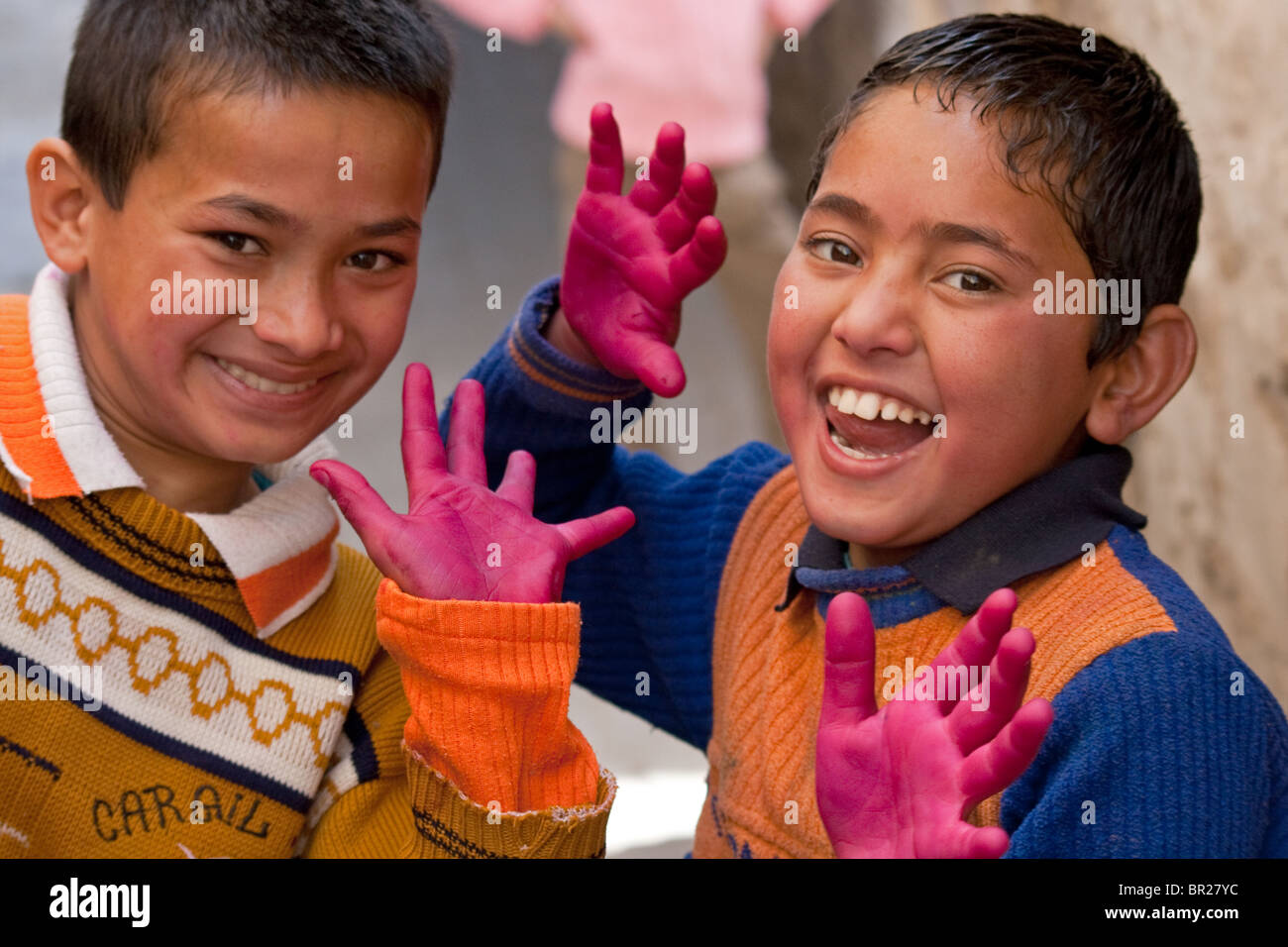 Couple of Indian teenagers making merry at the hindu festival of colours (holi) in Almora, India. Stock Photo