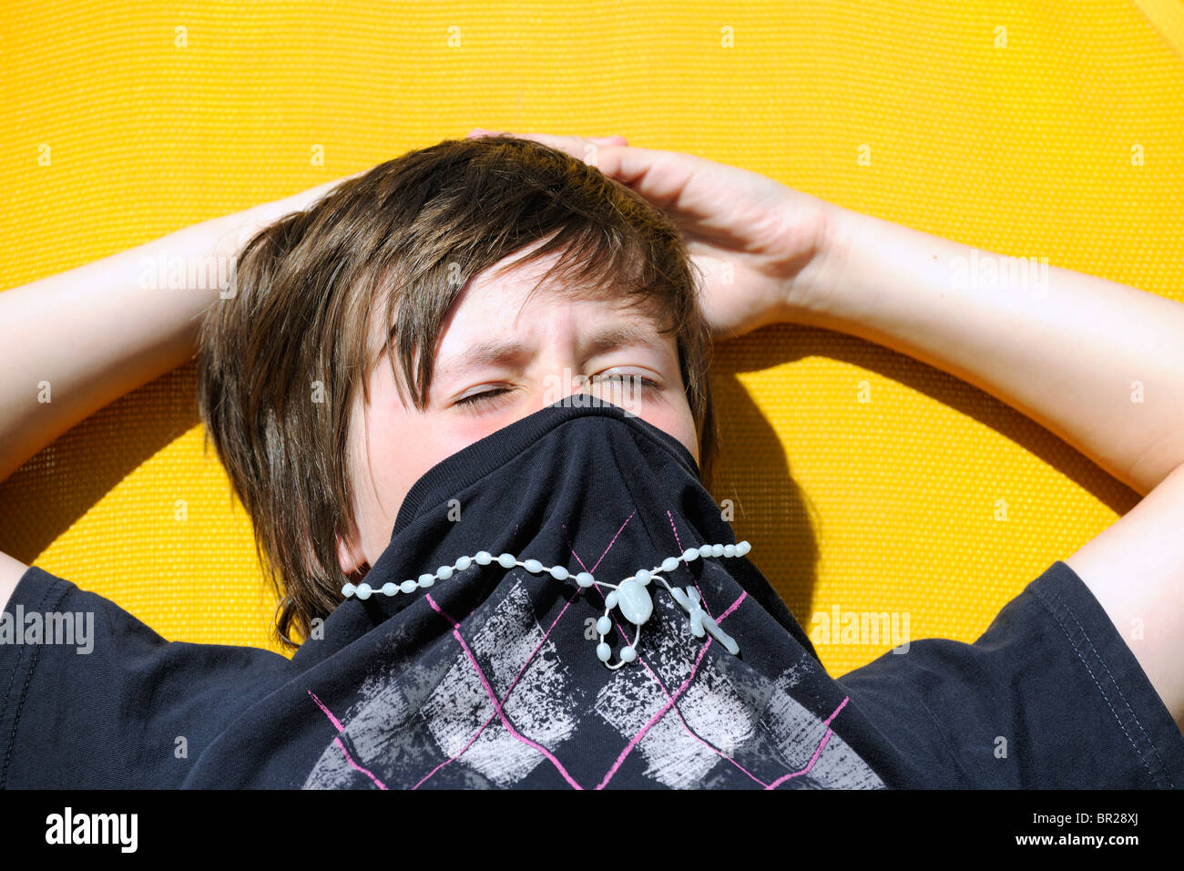 Teenage Boy bask in the Sun Stock Photo Alamy