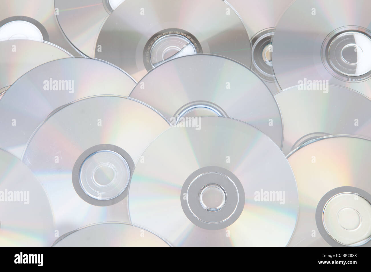 background made out of silver compact discs CDs in closeup Stock Photo