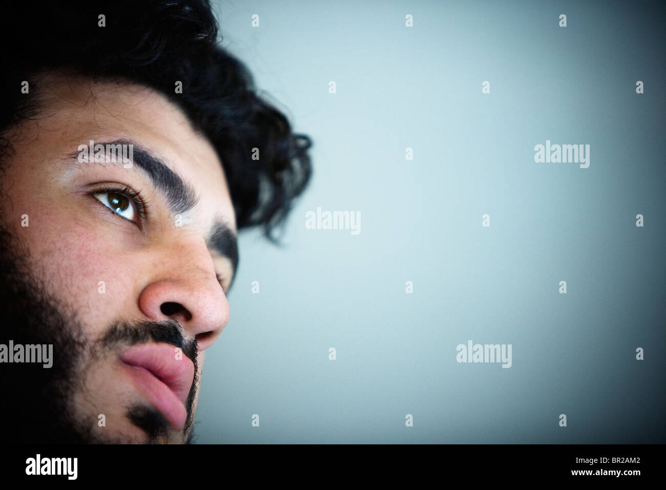 Serious young man one hi-res stock photography and images - Alamy