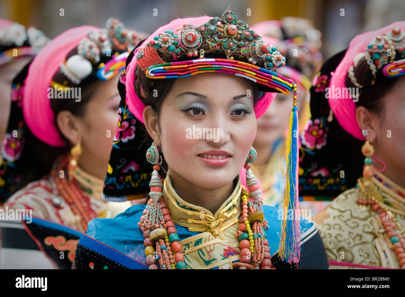 Ethnic Tibetan performer wears traditional costume at dance and folk