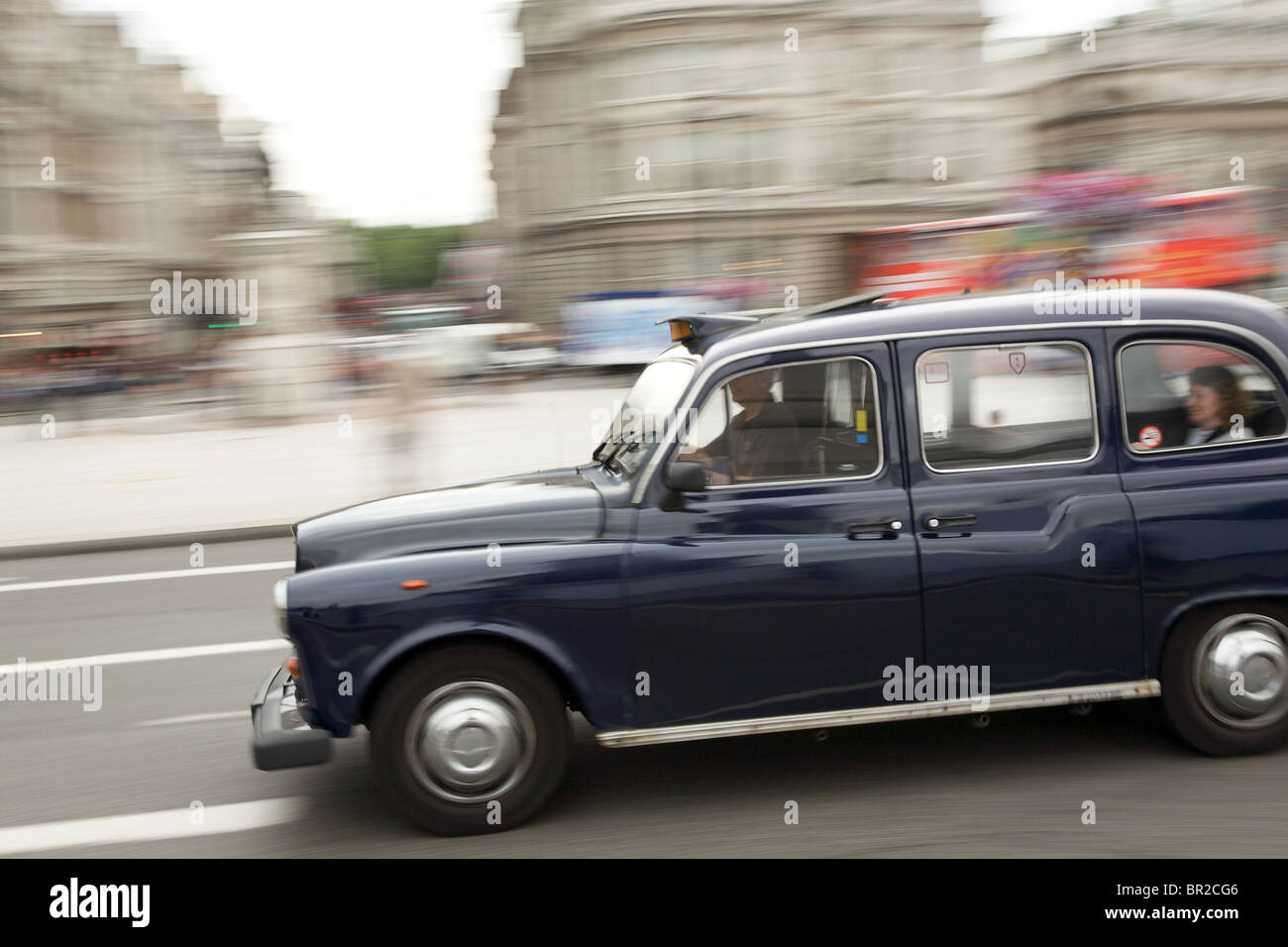 Taxi in Trafalgar Square, London Stock Photo