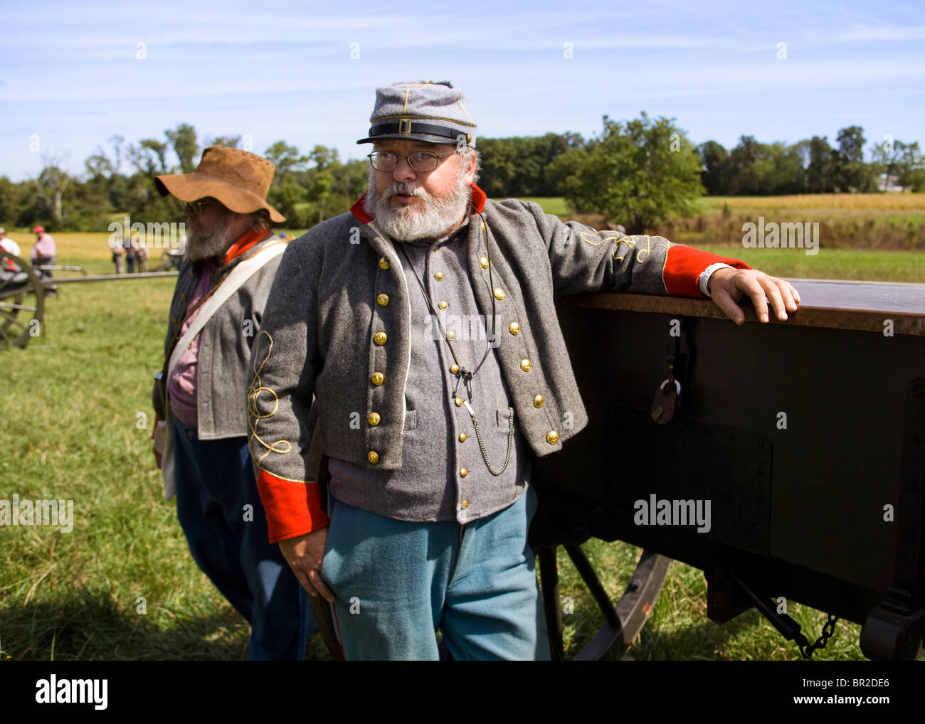 American Civil War reenactor standing next to a limber Stock Photo