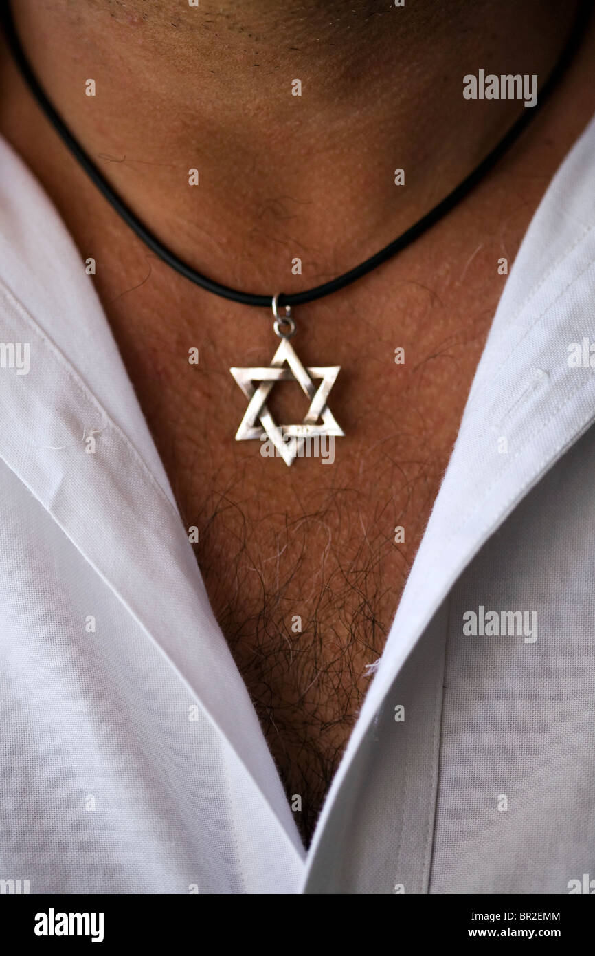 A portrait of a man with a Star of David necklace at Dr. Shakshouka, a kosher Tripolitanian restaurant in Jaffa, Tel Aviv Stock Photo