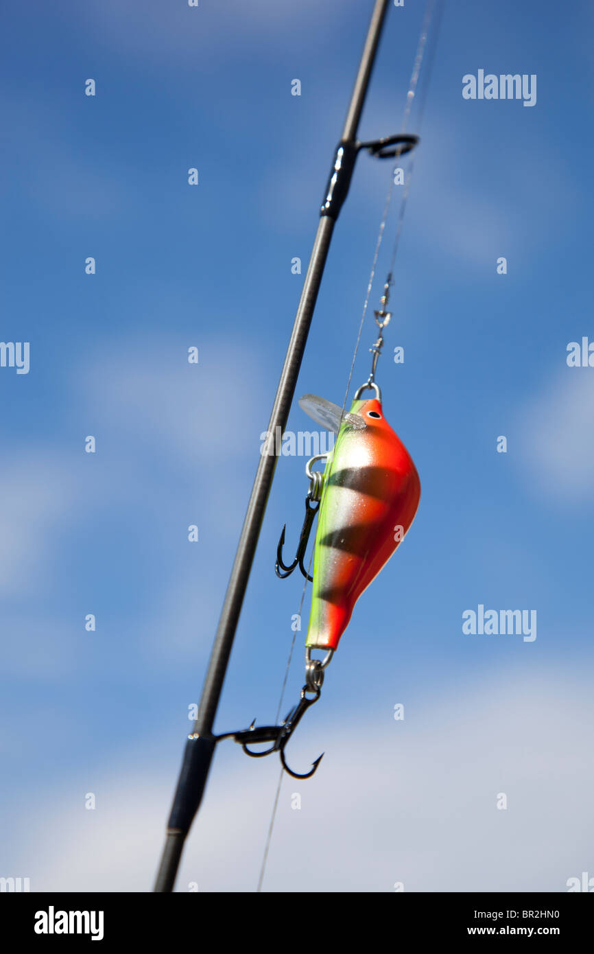 Top view of two colorful fishing rod bobbers on a black background Stock  Photo - Alamy