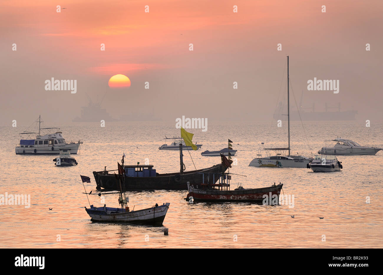 Boats moored offshore. Mumbai harbour, India Stock Photo