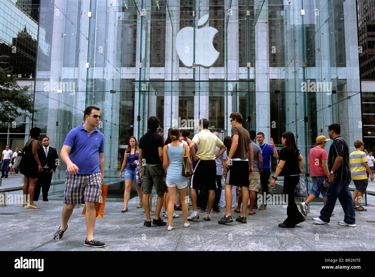 New York Group of People Outside The Apple Store on Fifth Avenue USA Stock Photo