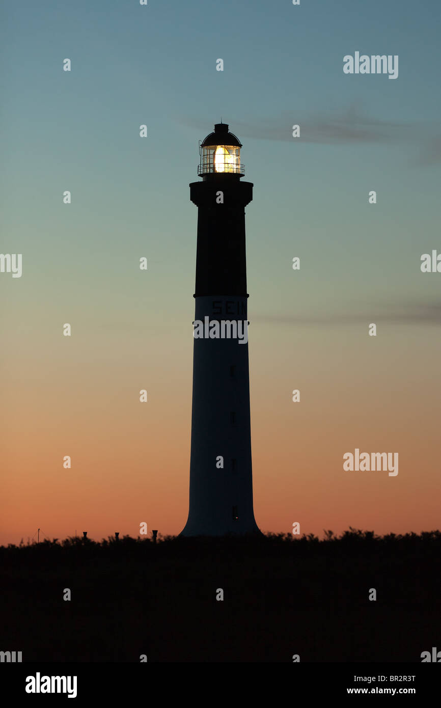 lighthouse illuminated at night, ile de sein, brittany, france Stock Photo