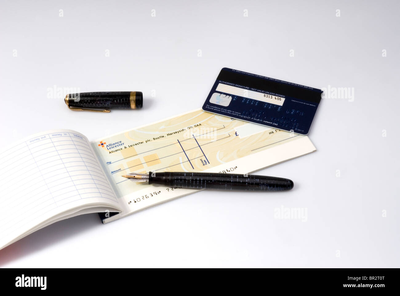Cheque book pen and  bank card Stock Photo