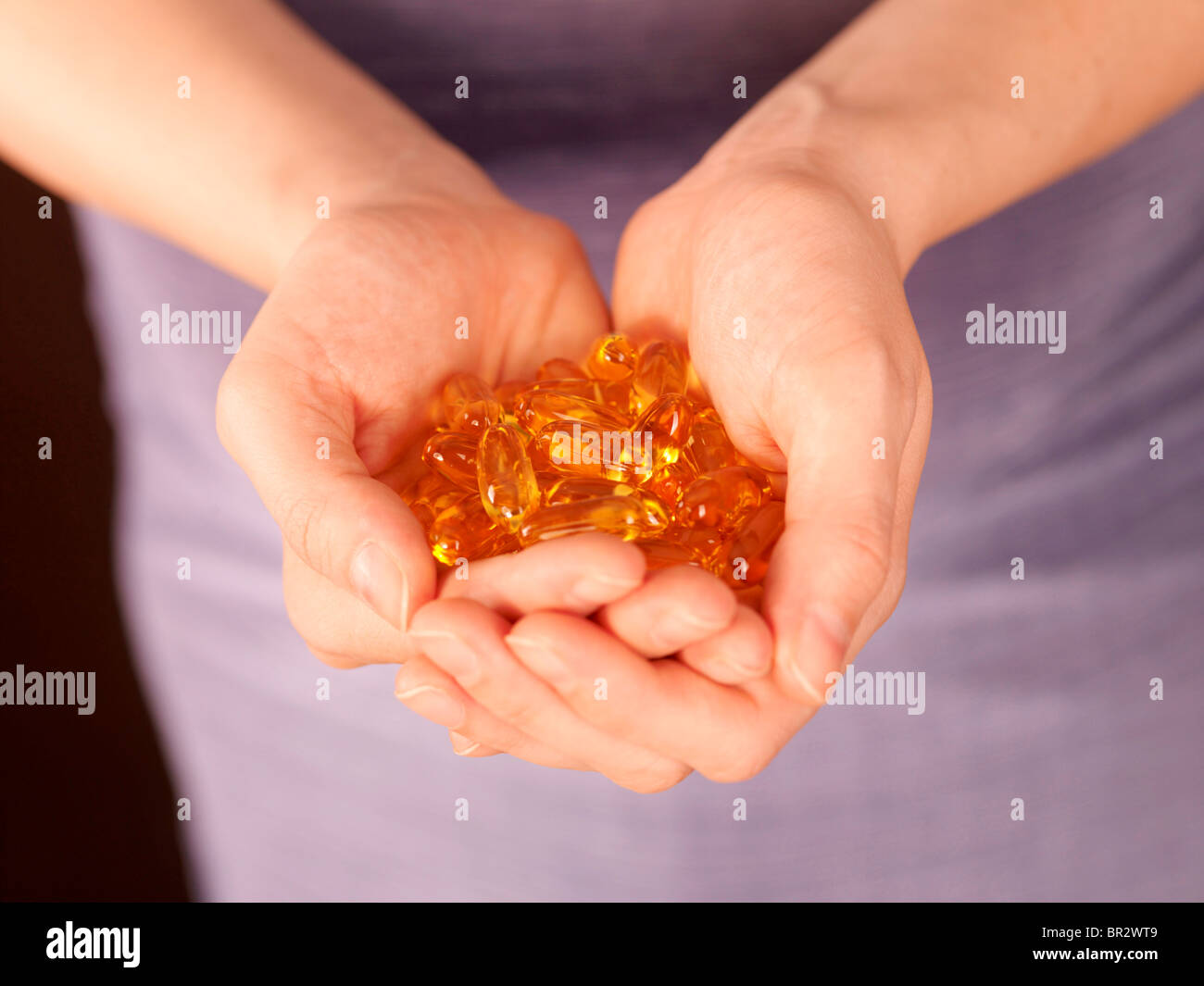 Pregnant Woman Holding Cod Liver Oil. Model Released Stock Photo Alamy