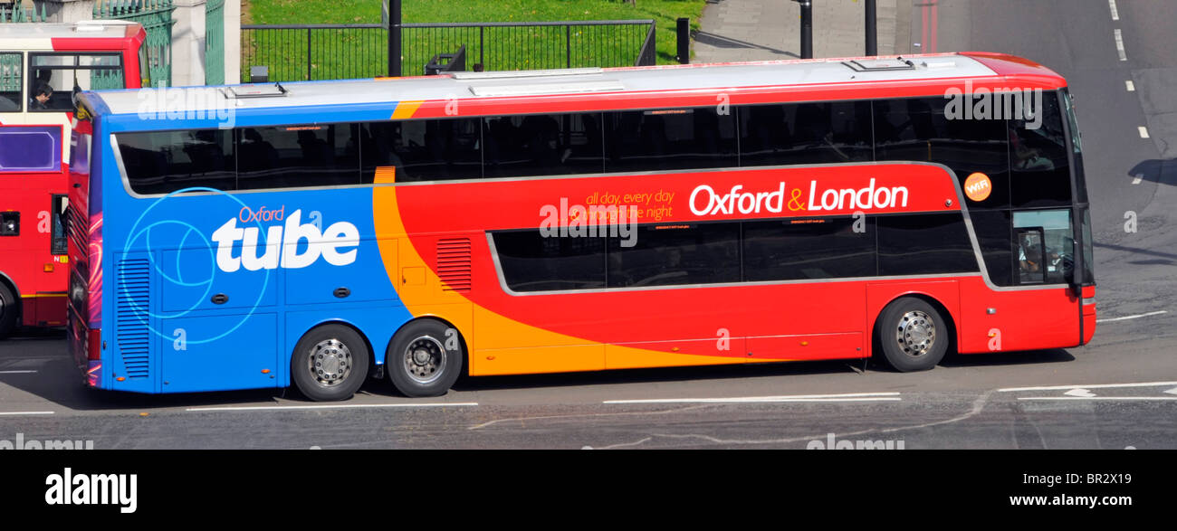 Looking down from above side view Oxford London public transport double decker tube bus coach & driver operated by Stagecoach bus business England UK Stock Photo