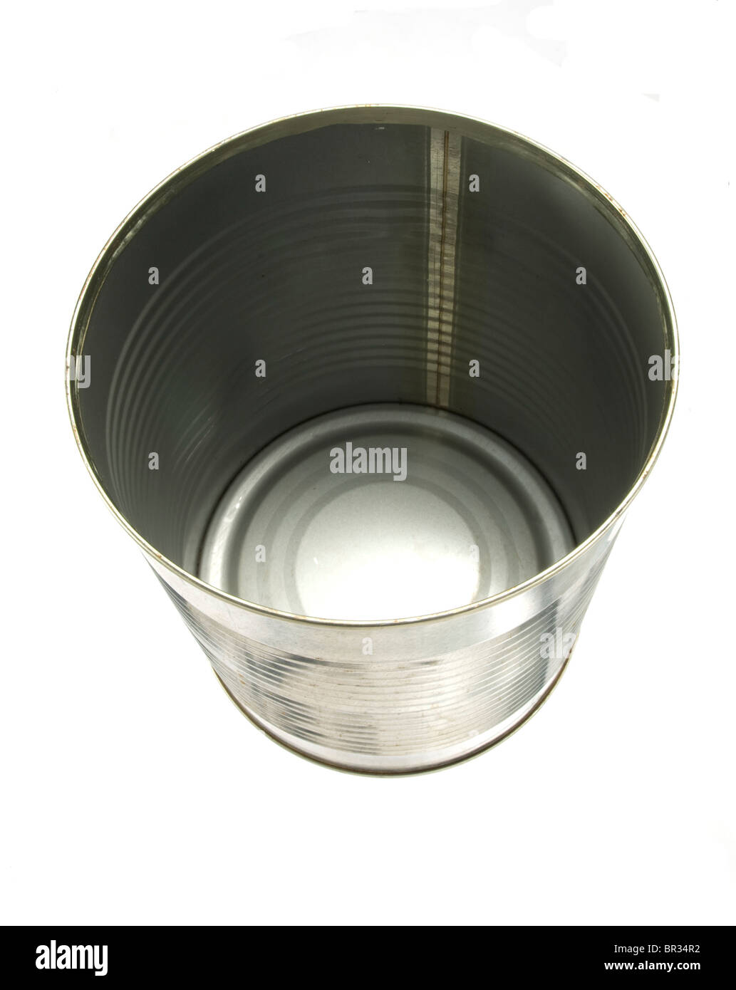 An open, empty tin can showing the inside of it. Stock Photo